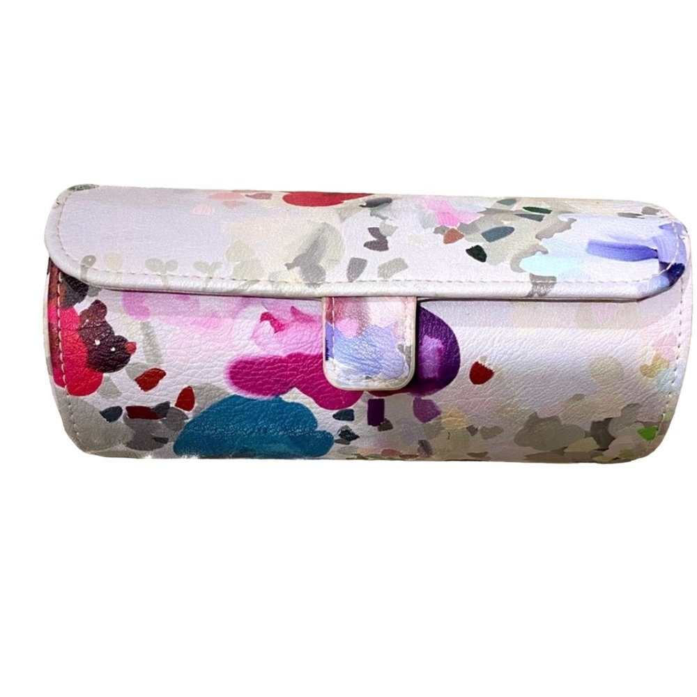 Floral travel roll up jewelry case.